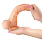 Gode ultra-réaliste va-et-vient 24cm flexible avec testicules - Real max