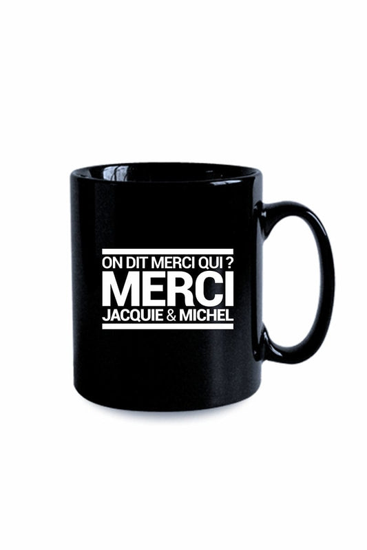 Mug noir J&M Tasse On dit merci qui ? - Jacquie et Michel